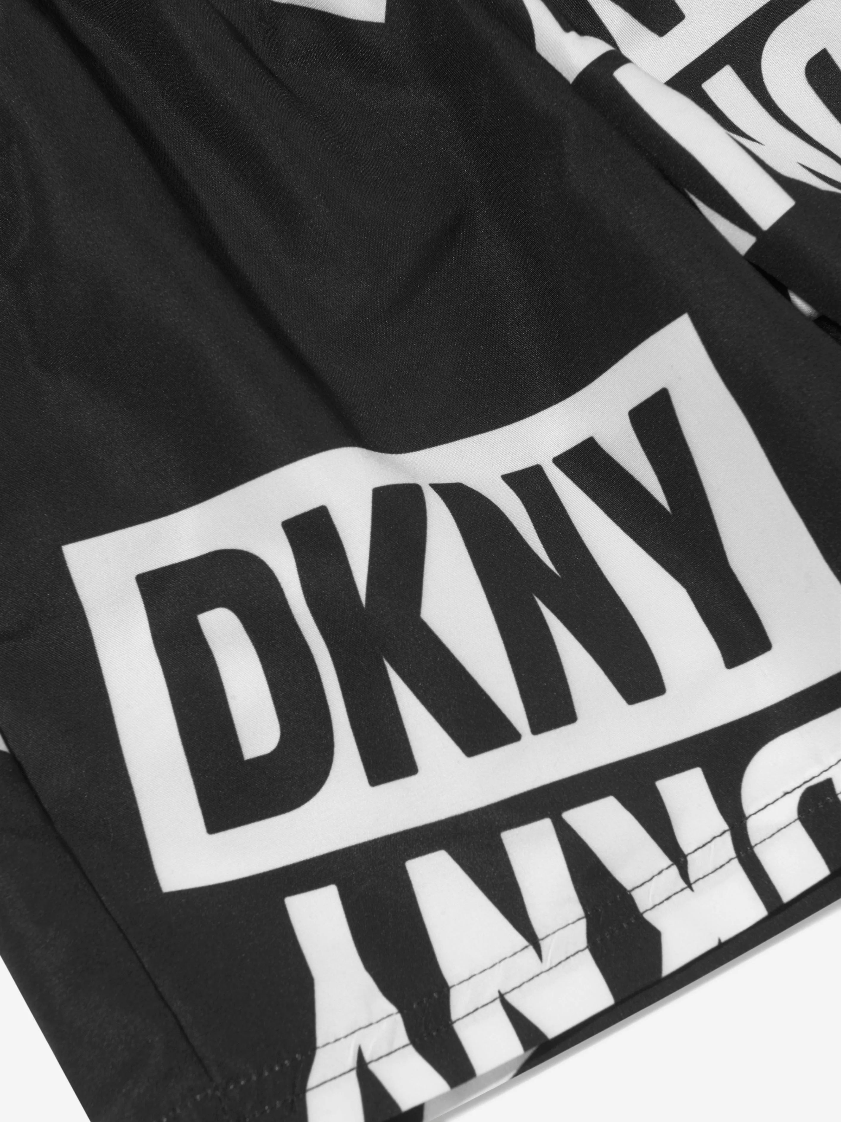 DKNY Boys Logo Print Swim Shorts in Black