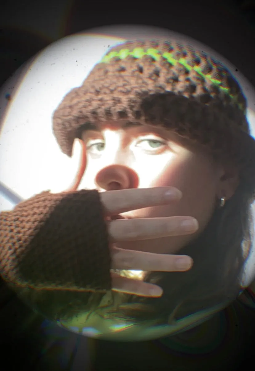 Handmade brown chunky crochet bowler hat with olive green stripe