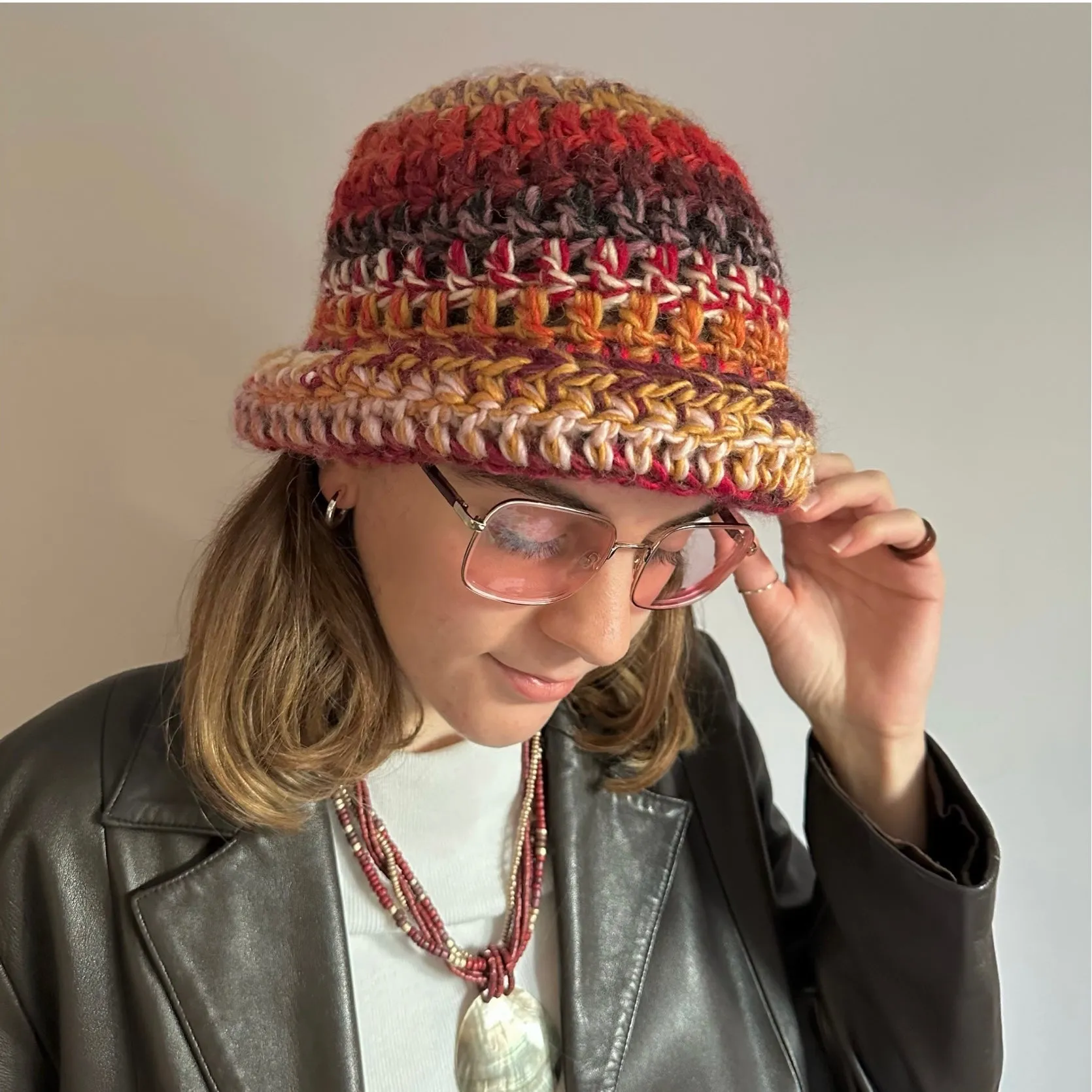 Handmade mulitcoloured red, black and mustard yellow chunky crochet bowler hat